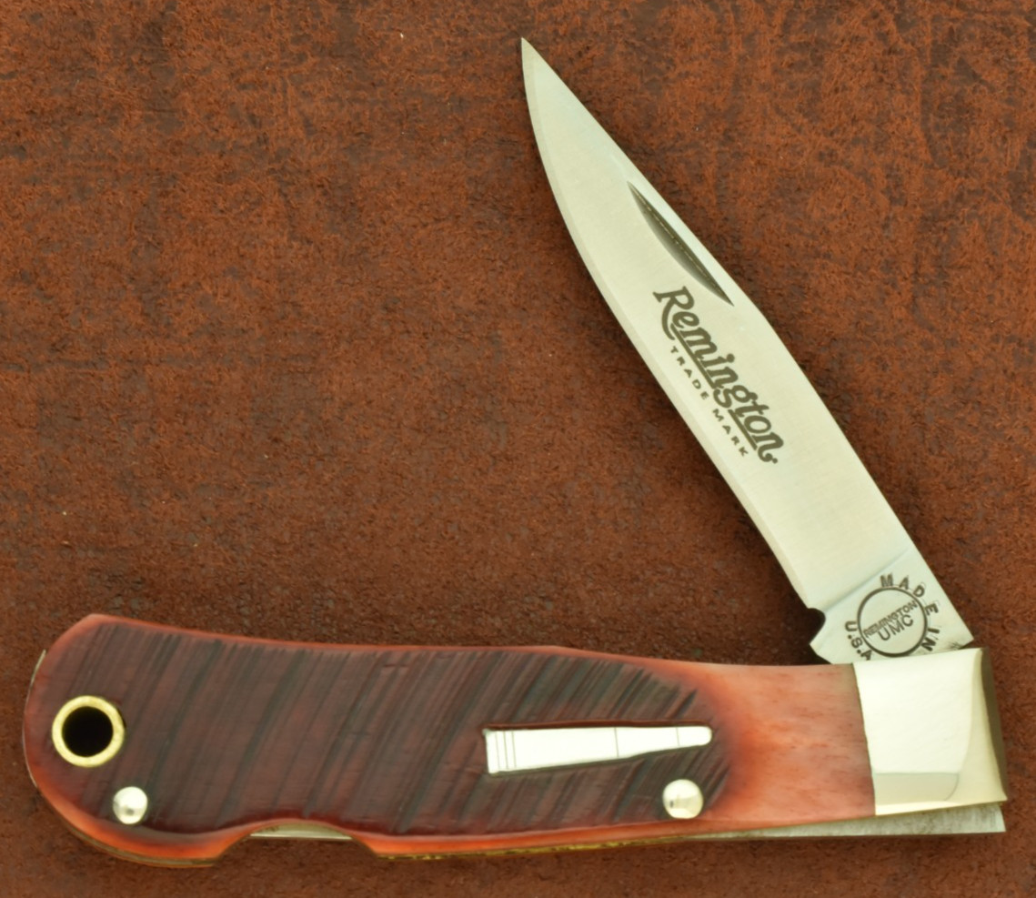 REMINGTON UMC USA BABY BULLET TRAPPER KNIFE LOCKBACK SAWCUT RED BONE 2014 (33066