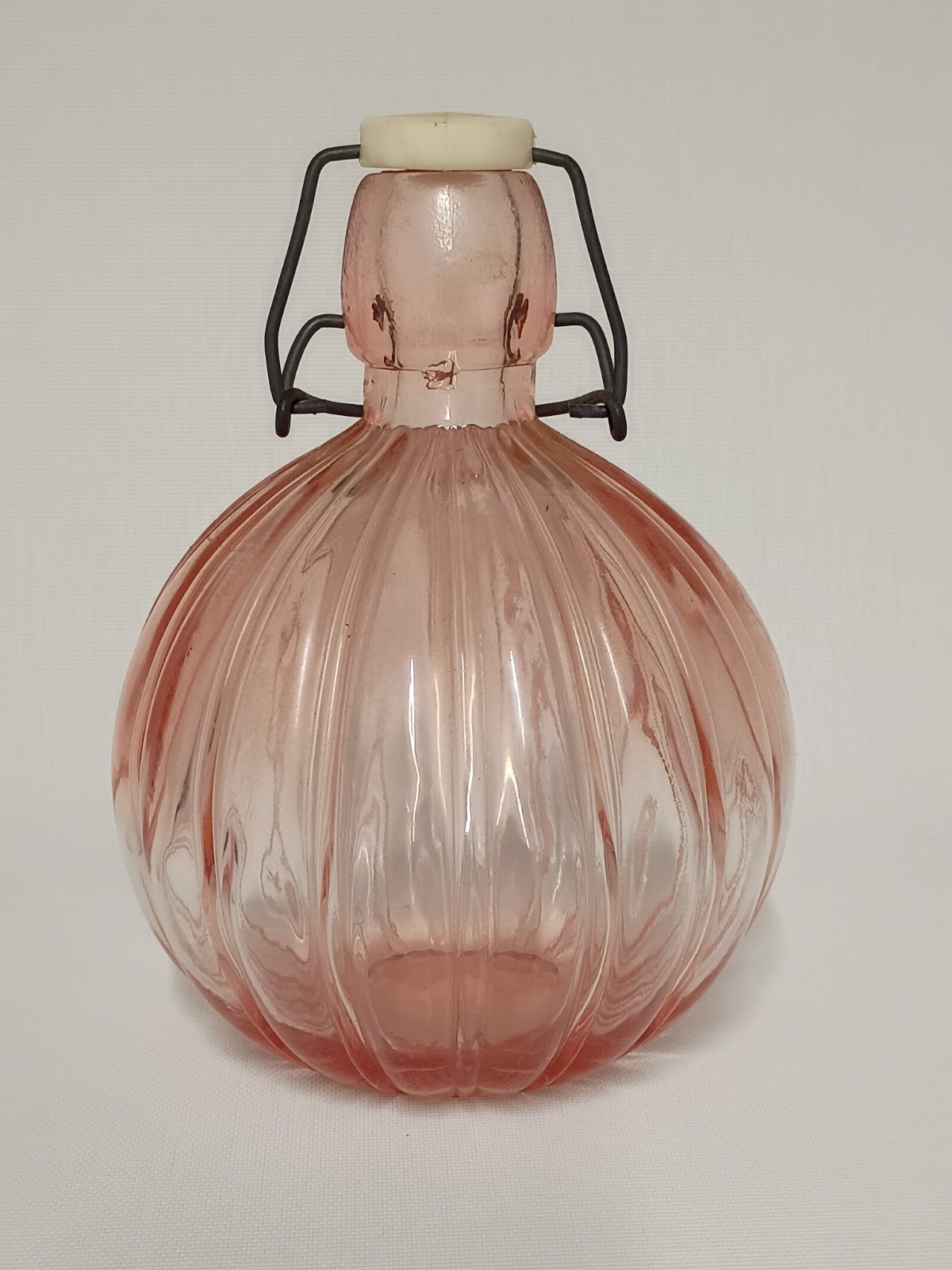 Vintage Pink Glass Depression Bulbous Decanter Bottle with Wire Bail Rubber Seal Vintage Pink Glass Depression Bulbous Decanter Bottle with Wire Bail Rubber Seal