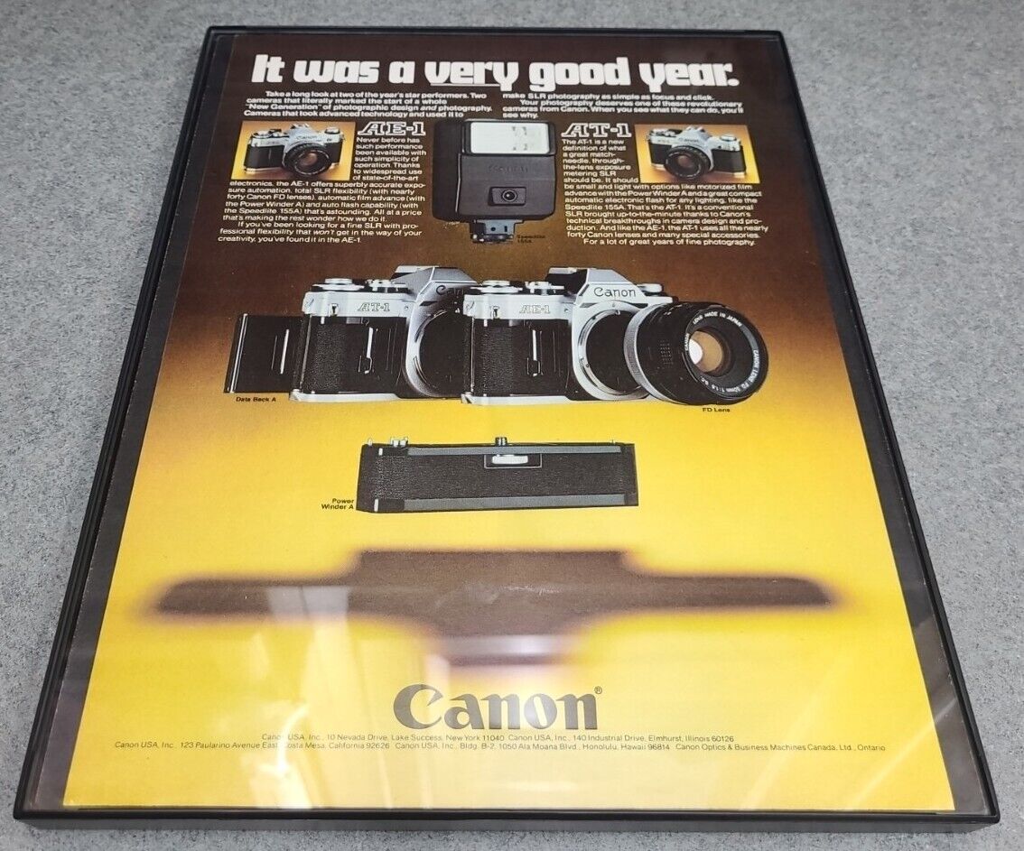 Canon AE 1 AT 1 Camera 1978 Vintage Print Ad SLR Photography Framed 8.5x11 