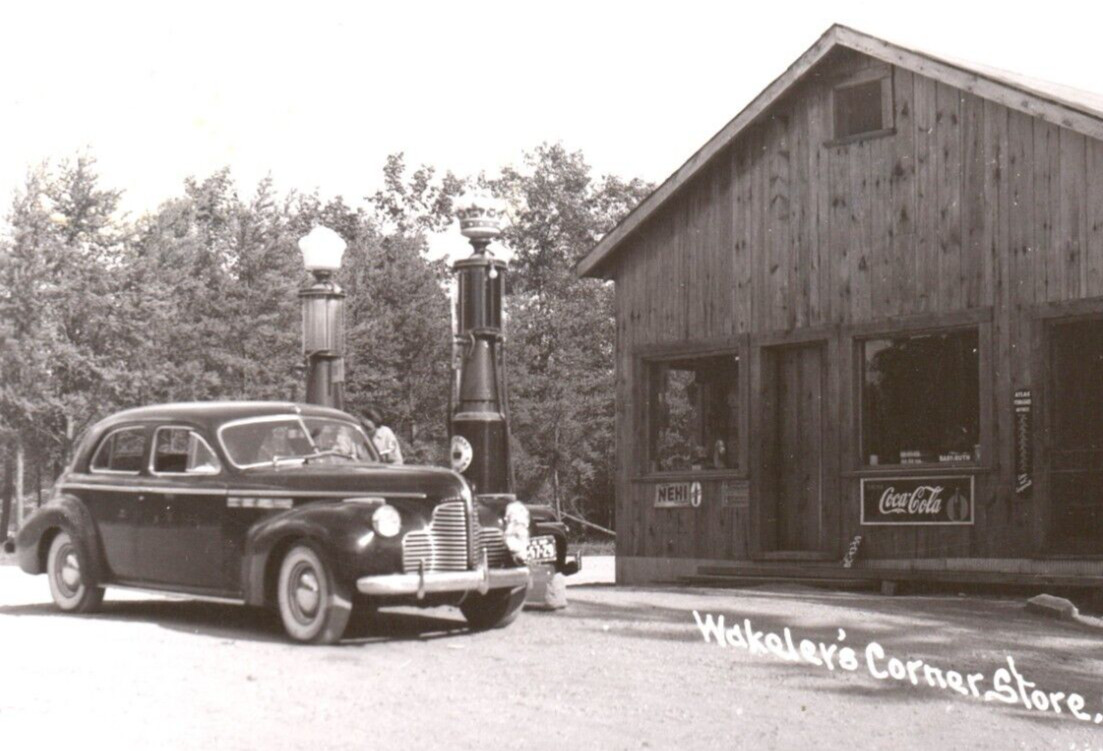 Grayling Wakalers Corner Store Michigan RPPC Postcard Nehi Coca Cola Gas Pumps Grayling Wakalers Corner Store Michigan RPPC Postcard Nehi Coca Cola Gas Pumps