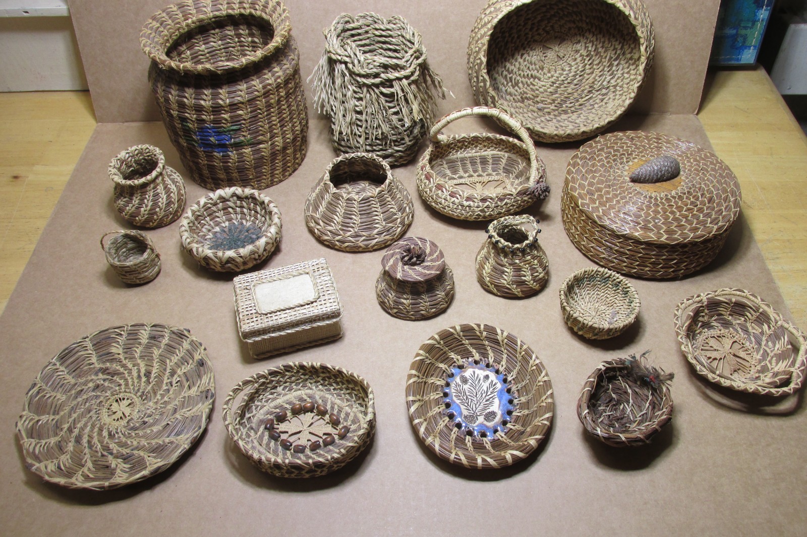 18 HAND MADE BASKETS, TRAYS, LIDDED HOLDERS & MORE