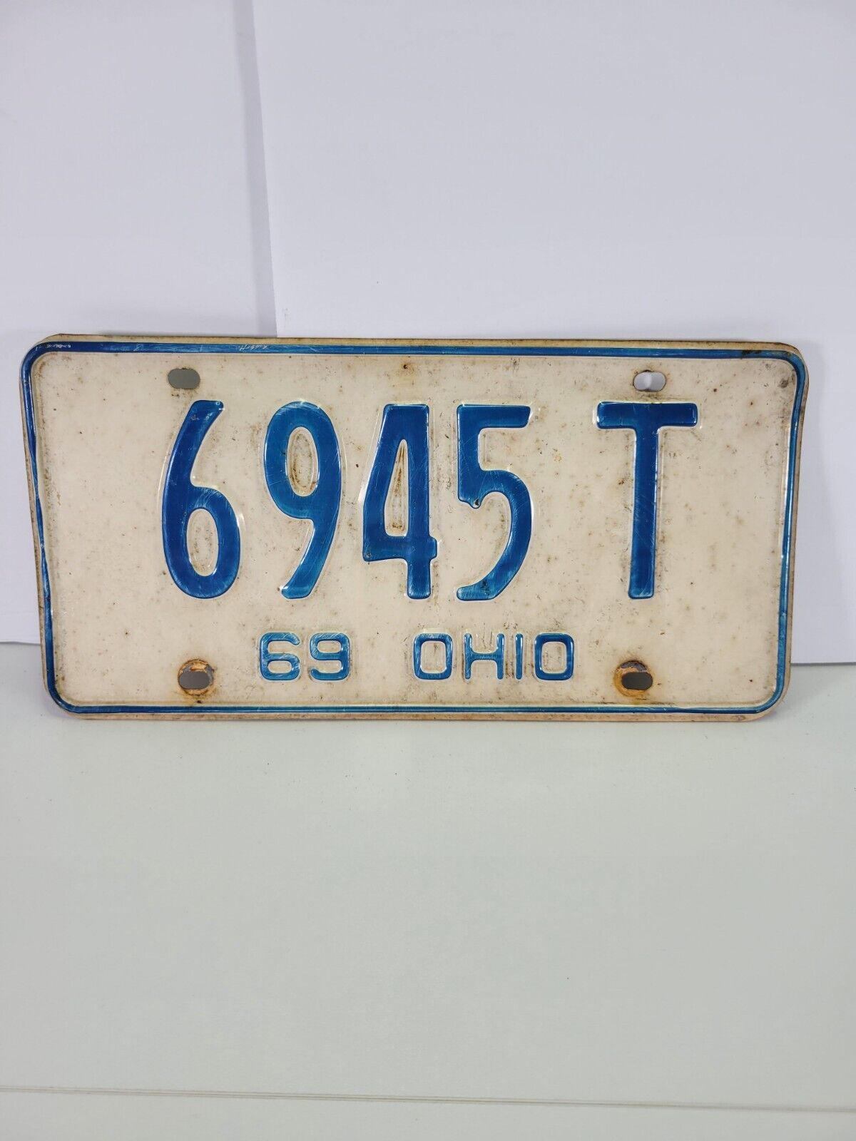 Vintage 1969 Ohio License Plate Blue Lettering White Background 6945 T USA