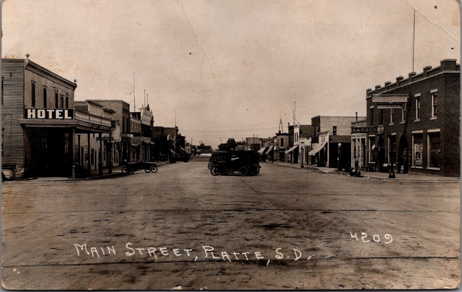 Vintage RPPC Main Street Platte SD 1923 Real Photo Postcard Hotel Garage Auto