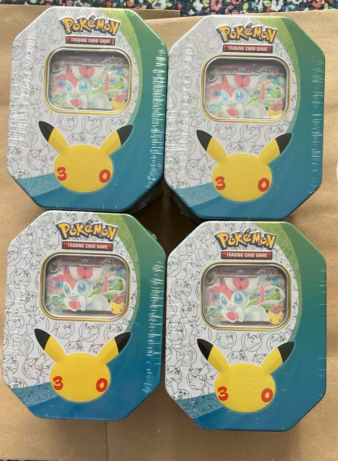 Pokémon Pokémon TCG 30th Anniversary Sylveon ex Tin SEALED x 4 Pokémon Pokémon TCG 30th Anniversary Sylveon ex Tin SEALED x 4