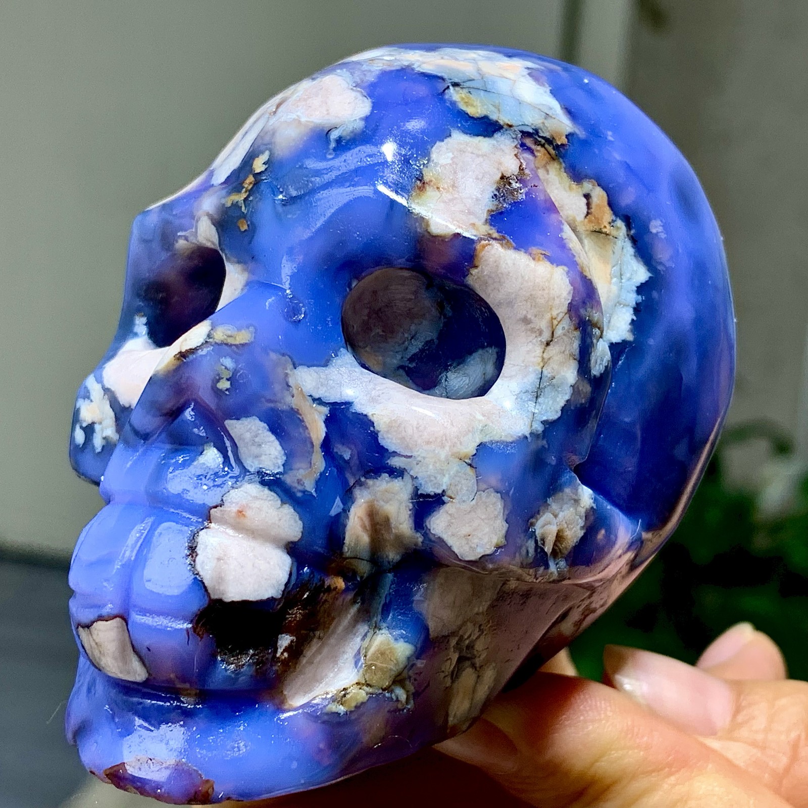 454G Natural Blue Cherry Blossoms agate hand carved skull ornament