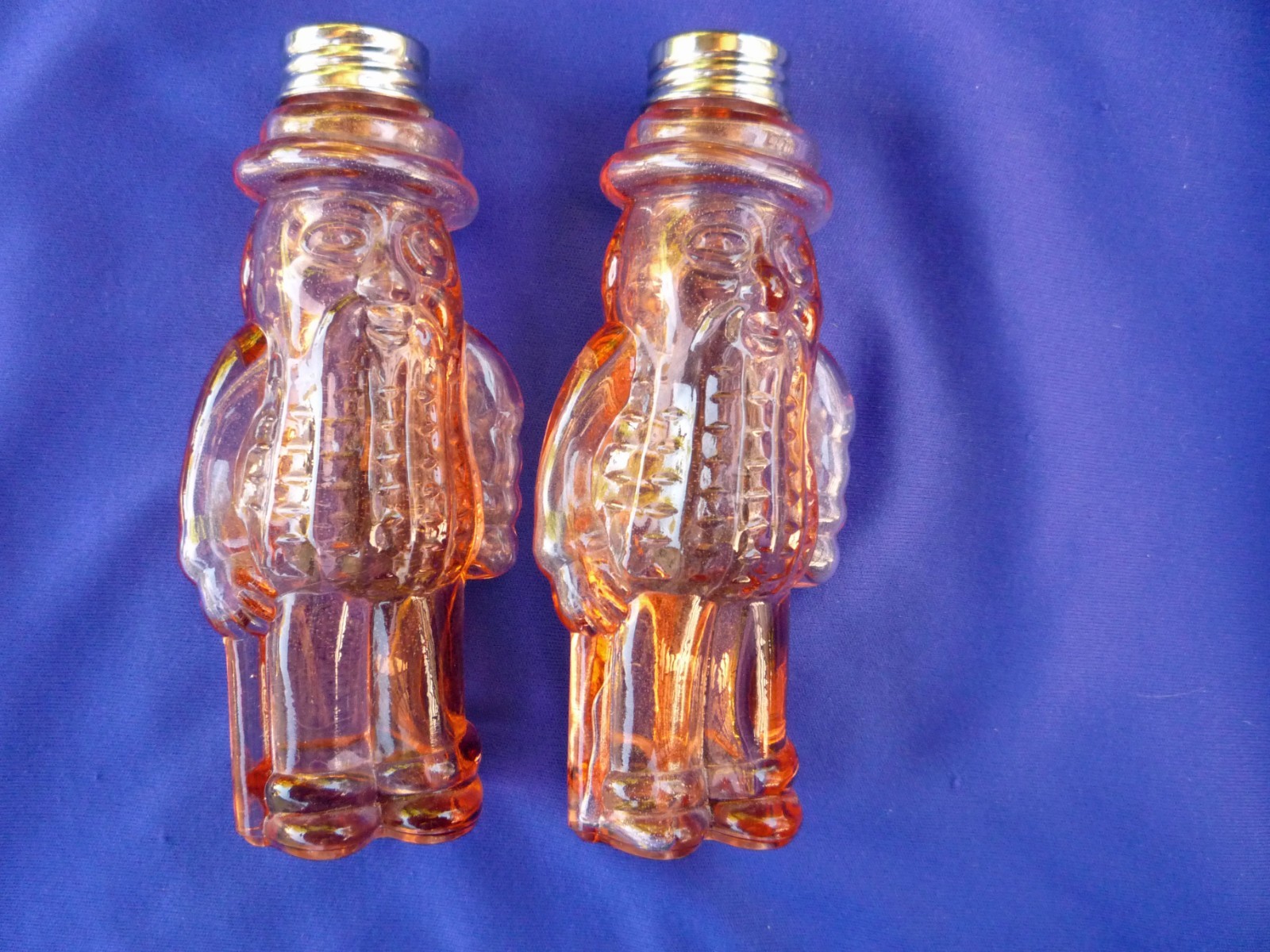 MR. PEANUT PINK DEPRESSION ERA GLASS SHAKERS SET WITH METAL TOPS RARE MR. PEANUT PINK DEPRESSION ERA GLASS SHAKERS SET WITH METAL TOPS RARE