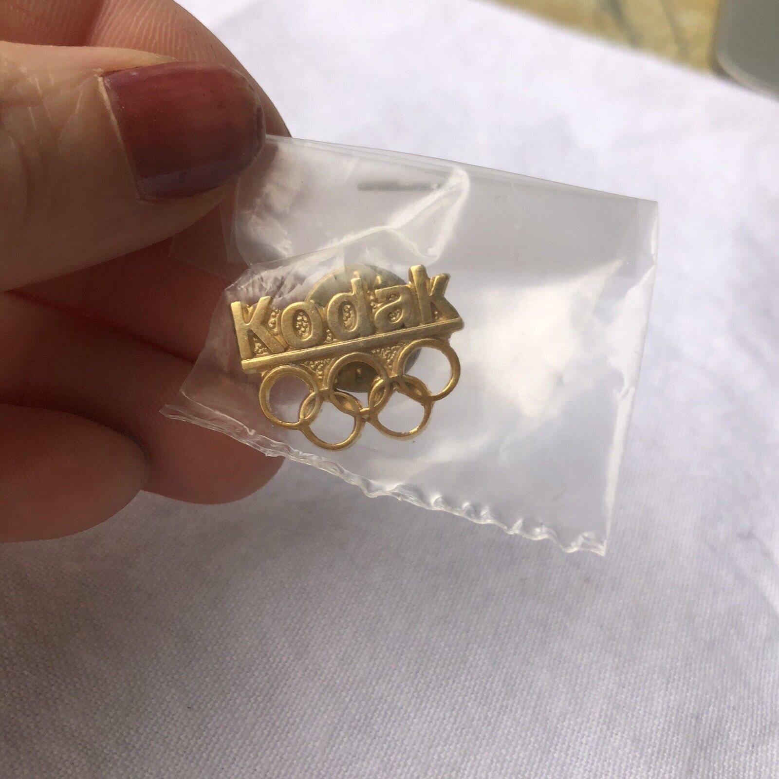all gold Kodak Olympic rings vintage lapel pin