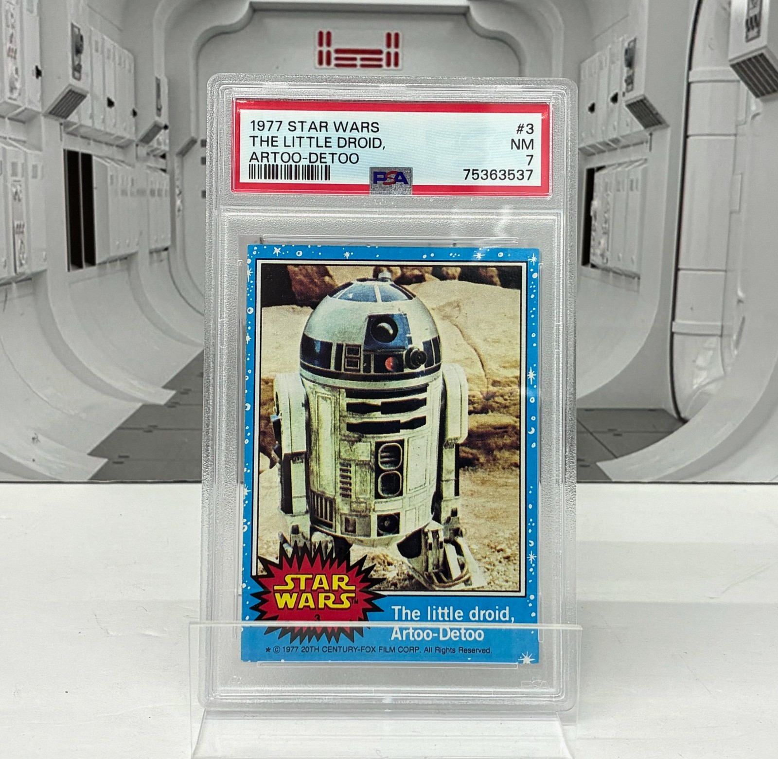 1977 Topps Star Wars The Little Droid Artoo-Detoo R2-D2 #3 PSA 7 Series 1 Blue 1977 Topps Star Wars The Little Droid Artoo-Detoo R2-D2 #3 PSA 7 Series 1 Blue