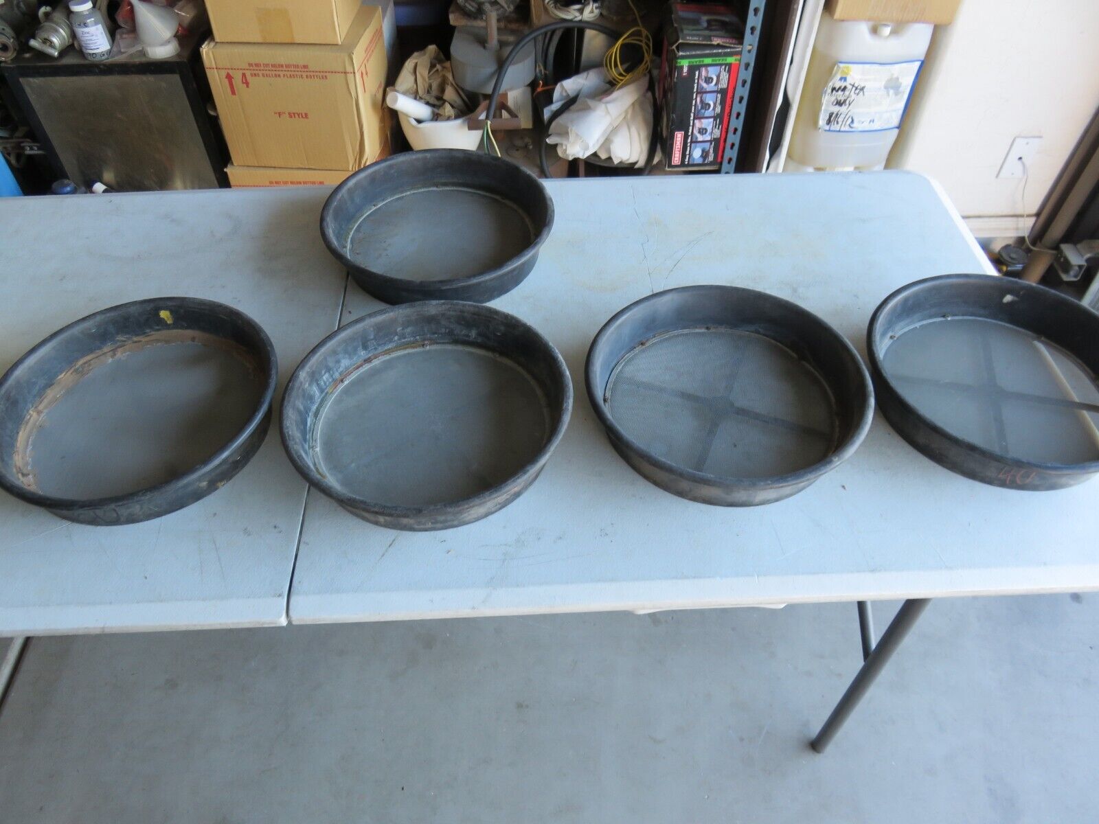 5 plastic screen sieves.  20,40,50, 60 mesh. Used. See Pics. Sold as lot of 5.