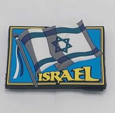 A 3D Magnet Of The Israeli Flag With The Word ISRAEL Highlighted In Gold Color picture