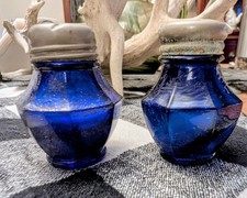 These are vintage octagonal salt and pepper shakers made from cobalt blue glass. picture