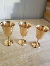 THREE BEAUTIFUL ALMOST 3 1/2 INCH TALL GOLD PLATED DRINKING COBLETS.NO MARKINGS. picture