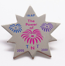 Vintage IAAP Lapel Pin The Power of TNT 2000 2001 Star Fireworks Design picture