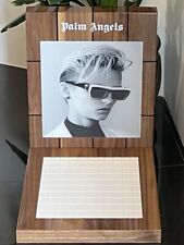PALM ANGLES - L-Shaped Counter Top Branded Display.  Lacquered Wood & White Tile picture