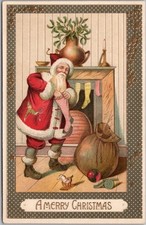 c1910s MERRY CHRISTMAS Embossed Postcard SANTA CLAUS Filling Stockings / UNUSED picture