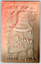 1909 A MERRY CHRISTMAS BELL IN WINDOW AIRBRUSHED THICK EMBOSSED ANTIQUE POSTCARD picture