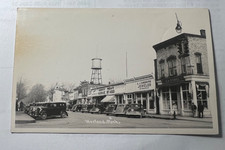 RPPC WAYLAND MICHIGAN G.J. ZUMBRINK JEWELER IGA BROOKS MARKET 1930S AUTOS picture