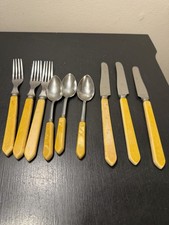 Vintage 9-piece stainless steel flatware lot with yellow Bakelite handles picture