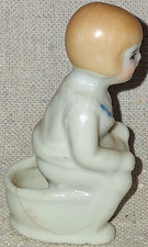 Vintage Japan Porcelain Baby Figurine on Chamber Pot, Glossy Glazed White picture