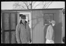 Photo:Spencer Iowa Marcus Miller and Mrs Miller 1936 Dog Outside Cabin picture