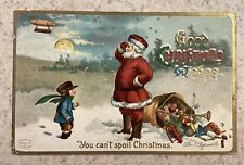 Clapsaddle Christmas Postcard Santa With Bag Of Toys Watching Blimp Smiling Sun picture