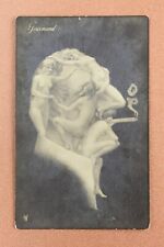 FOURMAND. Metamorphic Head man - nude nymphs. Cigarette. Antique postcard 1909s picture