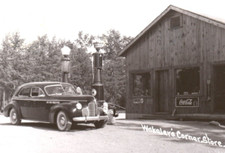 Grayling Wakalers Corner Store Michigan RPPC Postcard Nehi Coca Cola Gas Pumps picture