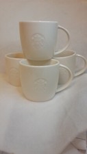 STARBUCKS 2010 Coffee Mug White Siren Mermaid Logo Embossed S picture