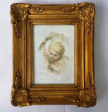 An Antique Porcelain Plaque with Cherub picture