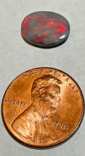 NEW - POLISHED OPAL -OVAL SHAPE - APPROX. 1/3