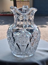 An American Brilliant Period cut glass pitcher with elaborate hobstar and fan... picture